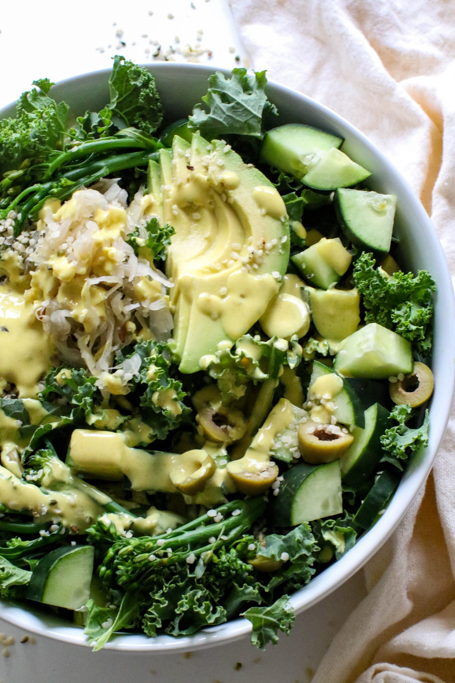 Green Macro Bowl served in a bowl with Turmeric Tahini by Flora & Vino 