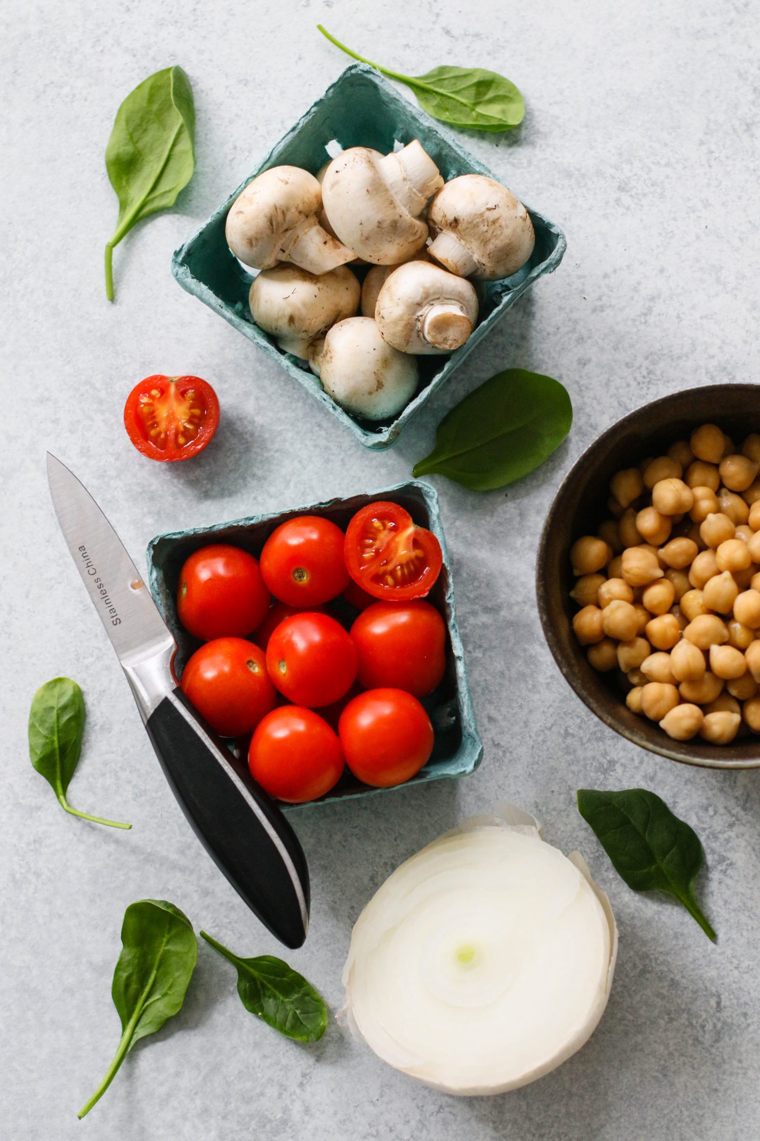 cherry tomatoes, mushrooms, onion, and chickpeas by Flora & Vino