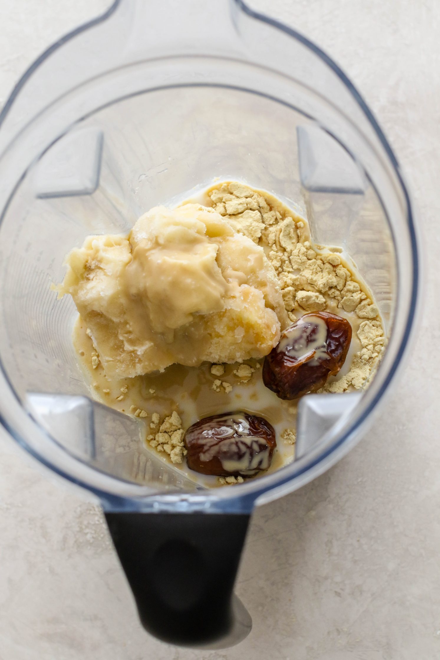 Tahini Date Shake ingredients in a Vitamix blender by Flora & Vino
