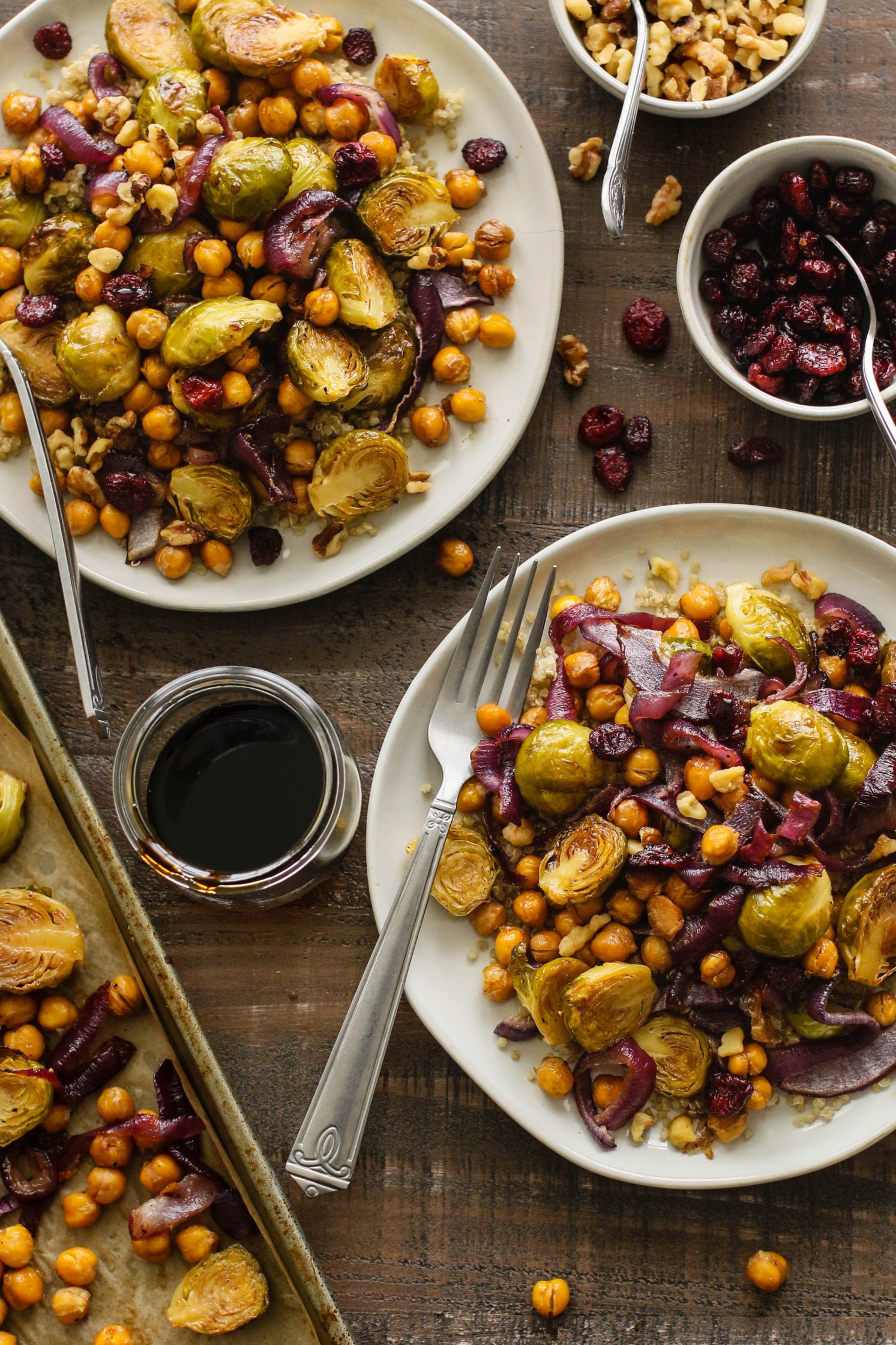Maple Balsamic Brussels Sprouts & Chickpeas Bake served on plates by Flora & Vino