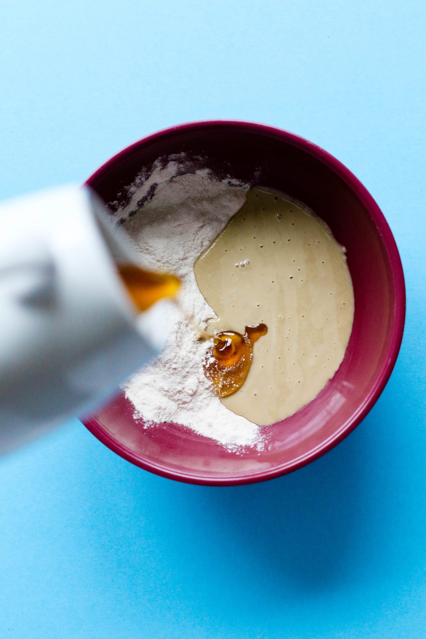 mixing tahini cookie batter by Flora & Vino