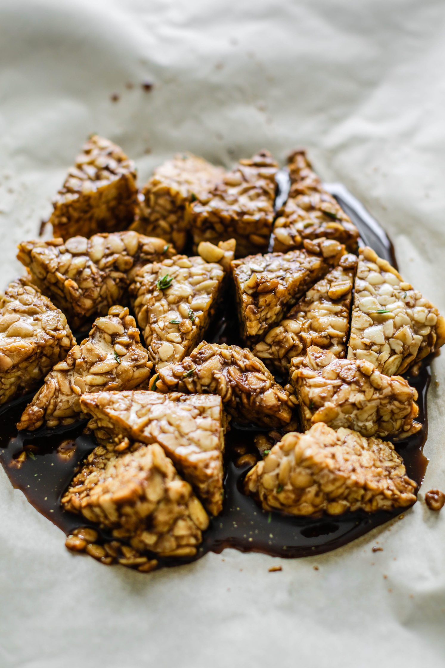 Maple Balsamic Tempeh baked on parchment paper