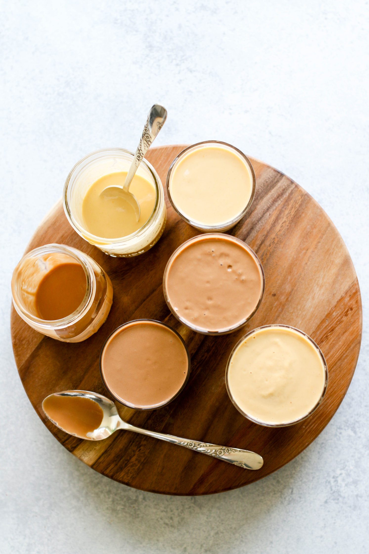 Fruit-Free "Fake Out" Shakes blended in glasses on wooden board by Flora & Vino