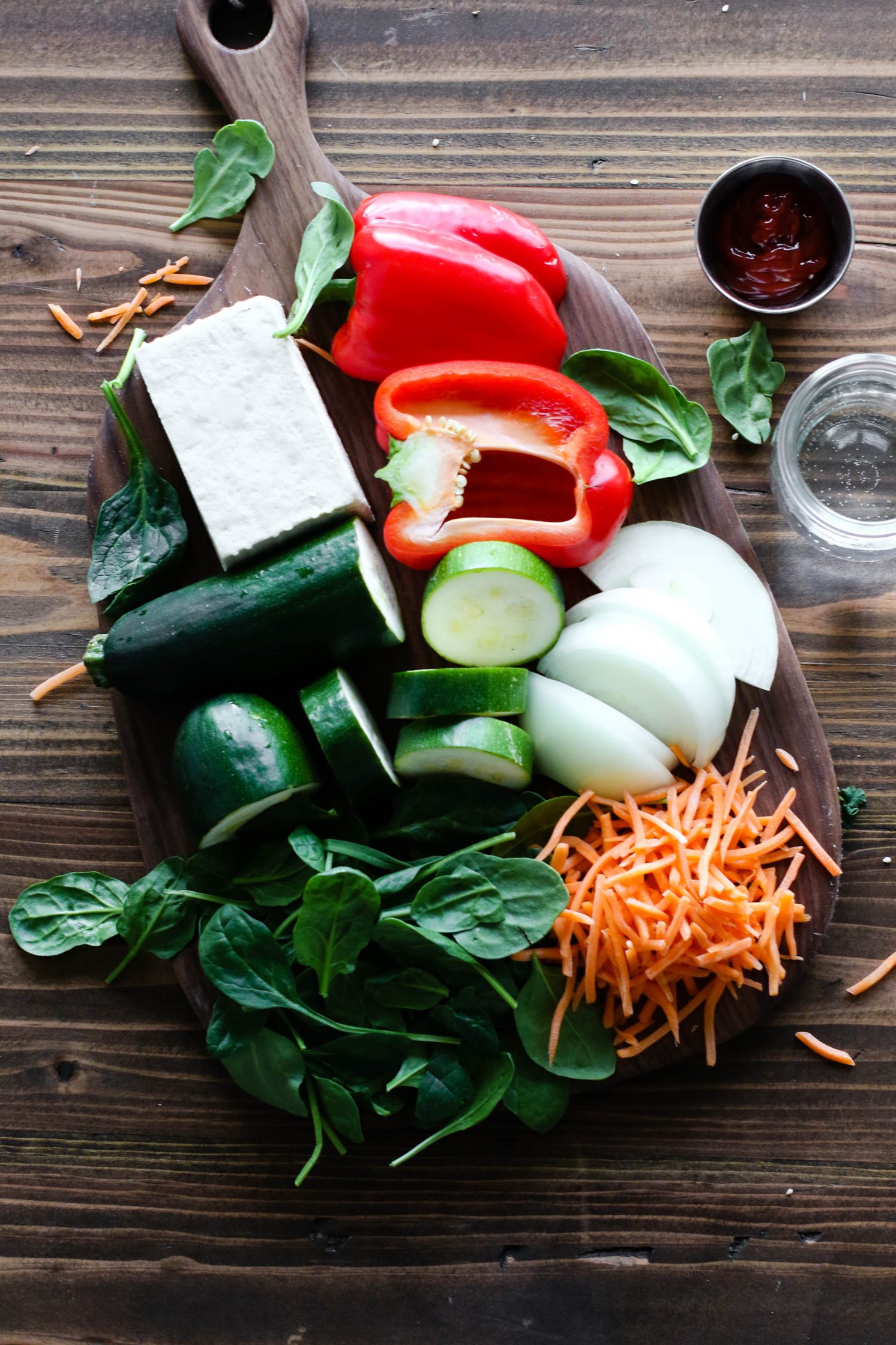 ingredients for tofu scramble on wooden board