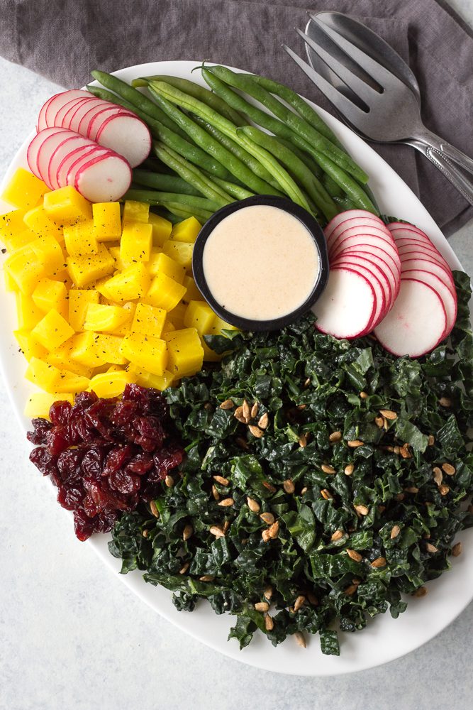 Golden Beet & Green Bean Salad served on platter with tahini dressing 