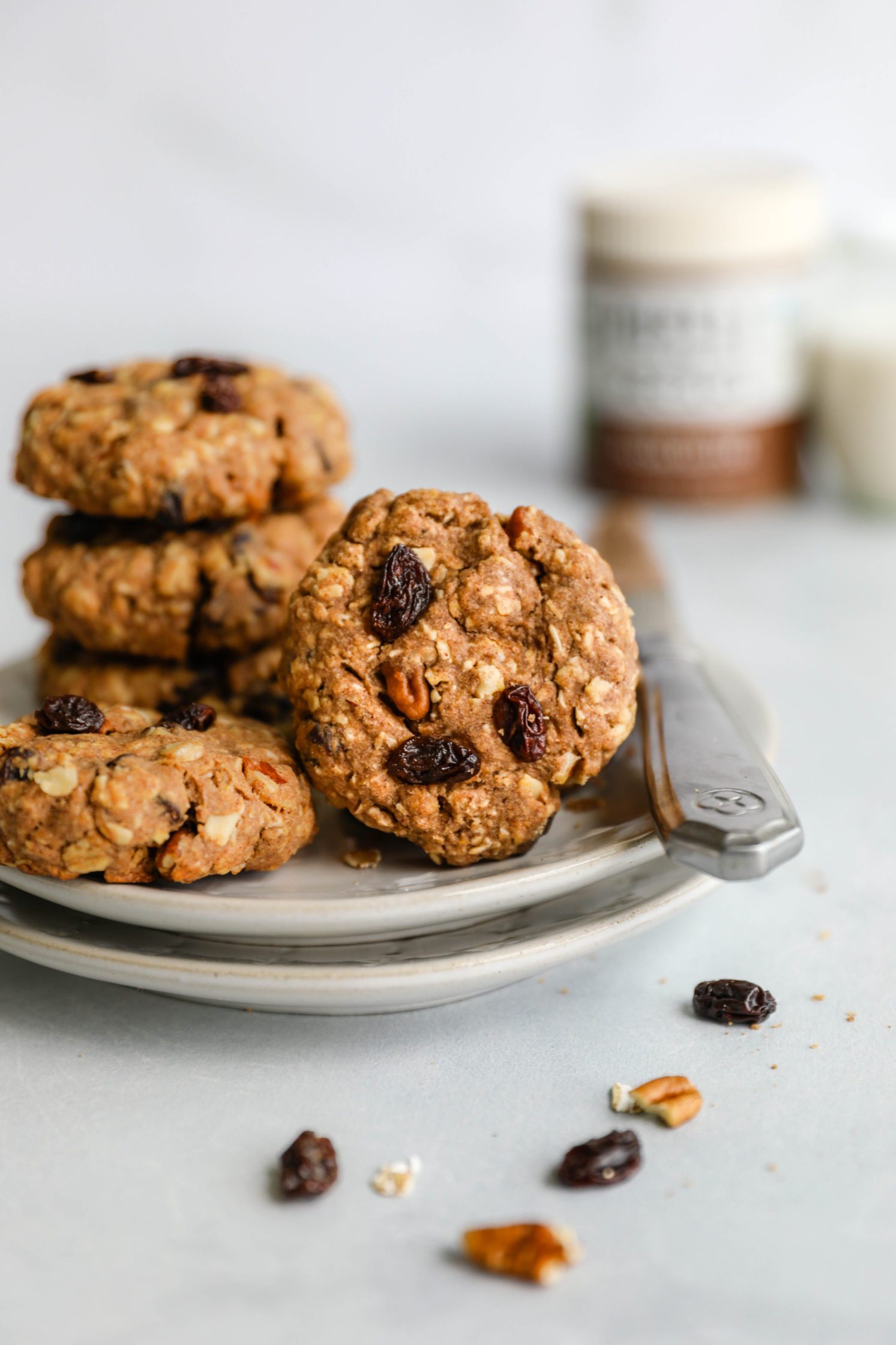 Oatmeal Raisin Pecan Cookies on two plates by Flora & Vino
