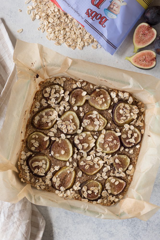 Fig Newton Breakfast Bars in parchment lined baking dish by Flora & Vino