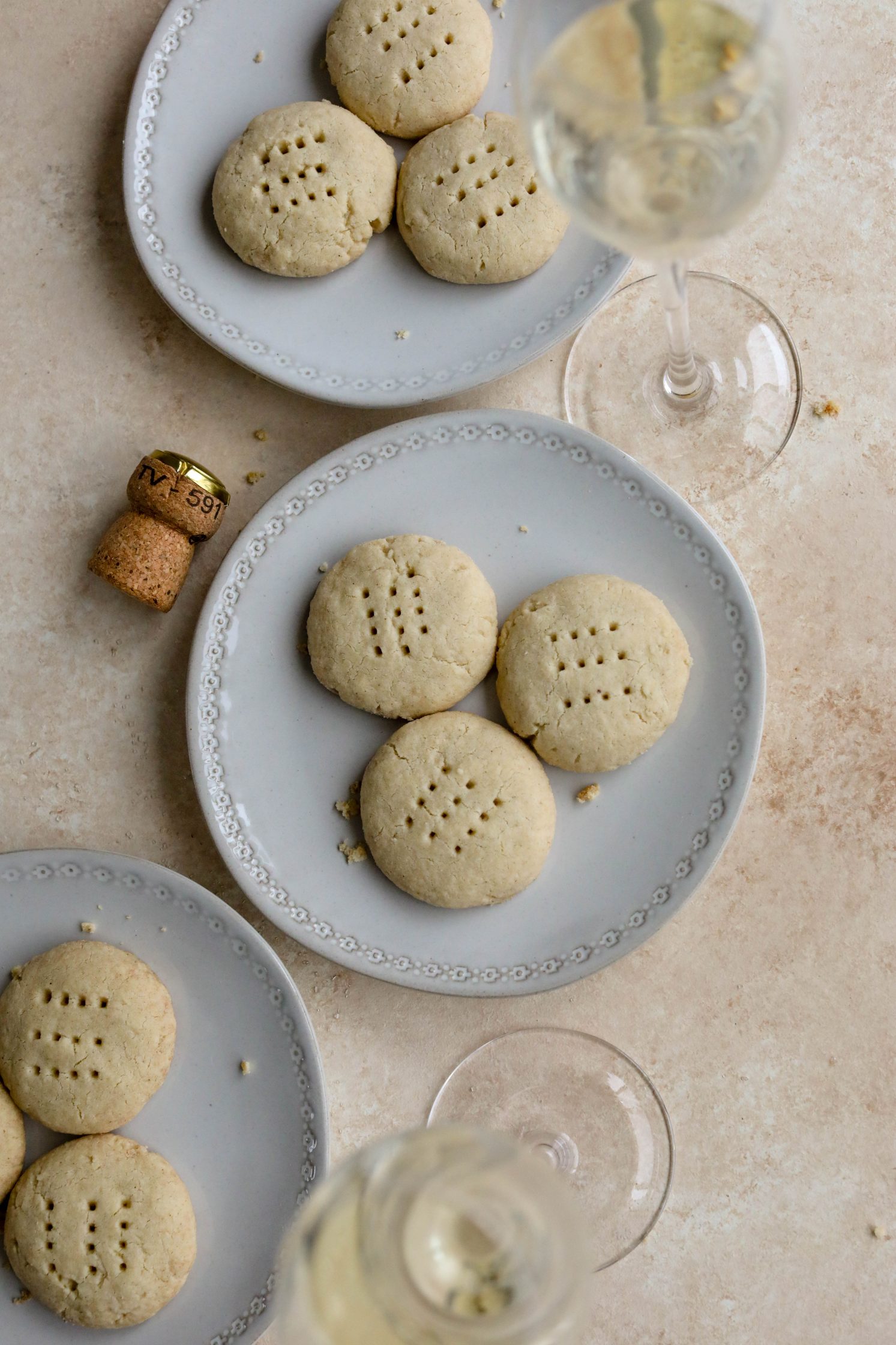 Vegan Shortbread Cookies served on plates with Prosecco by Flora & Vino
