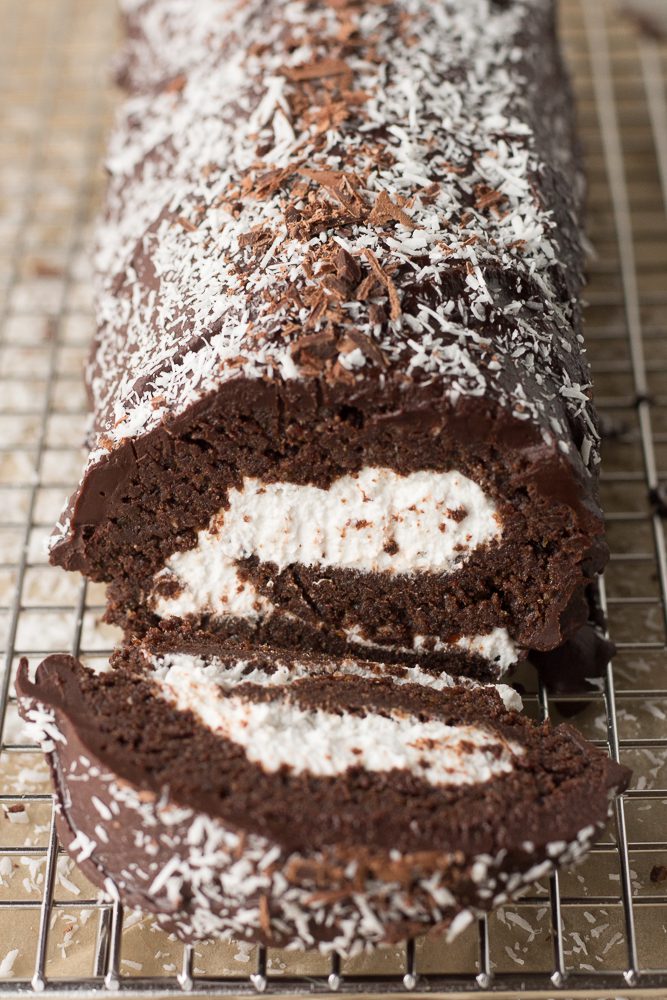 Dark Chocolate Swiss Roll on cooling rack by Flora & Vino