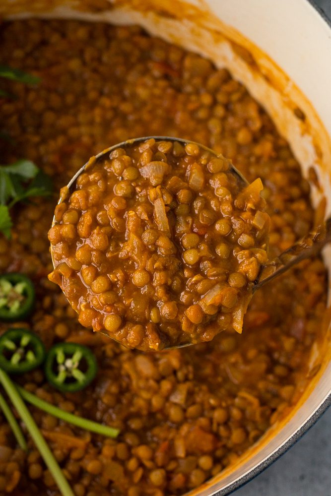 Lentil Tomato Soup served with a ladle by Flora & Vino 