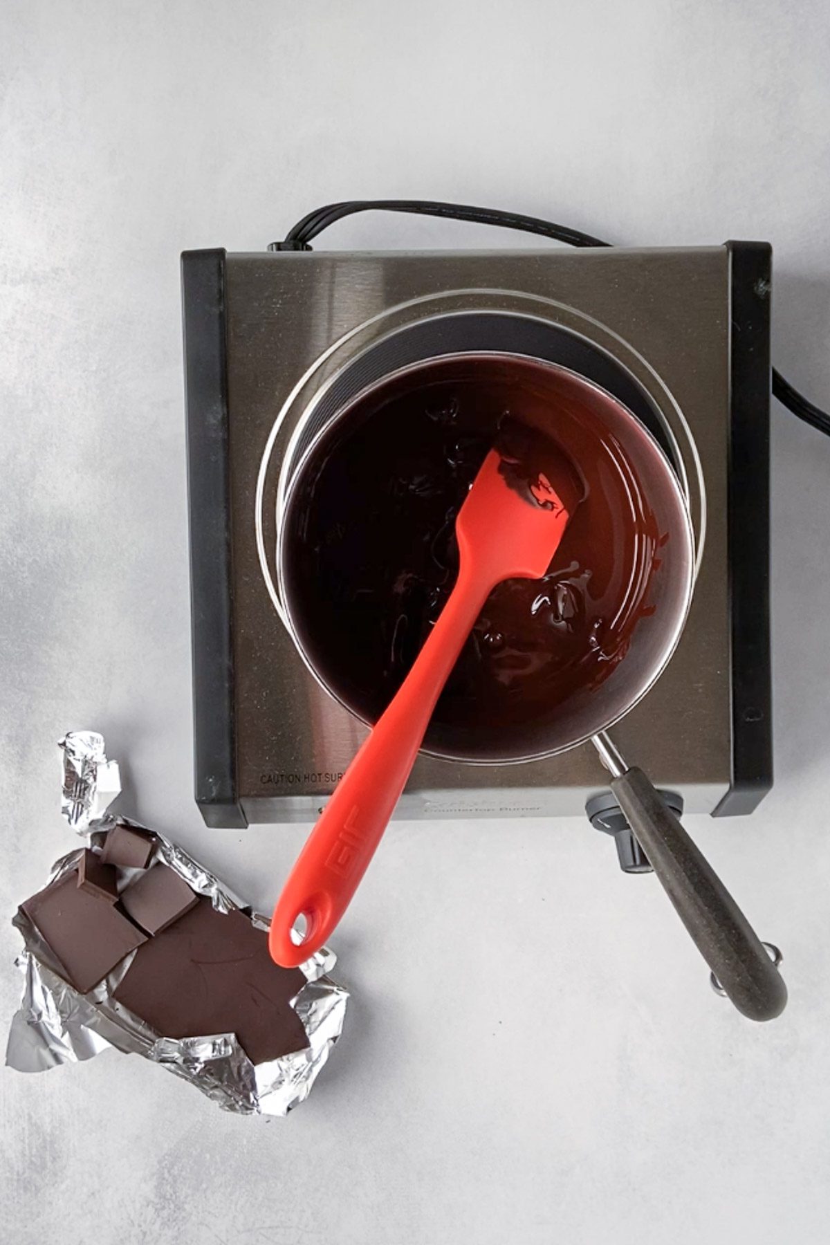 chocolate melted on stovetop by Flora & Vino