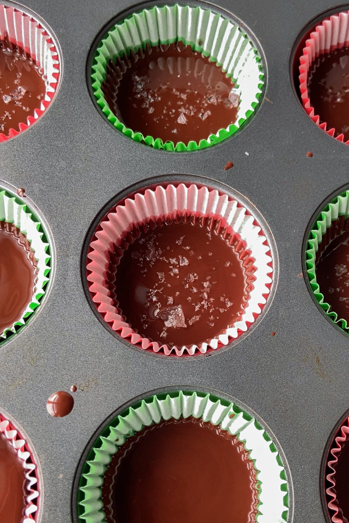 Chocolate Caramel SunButter Cups with sea salt sprinkled on top by Flora & Vino