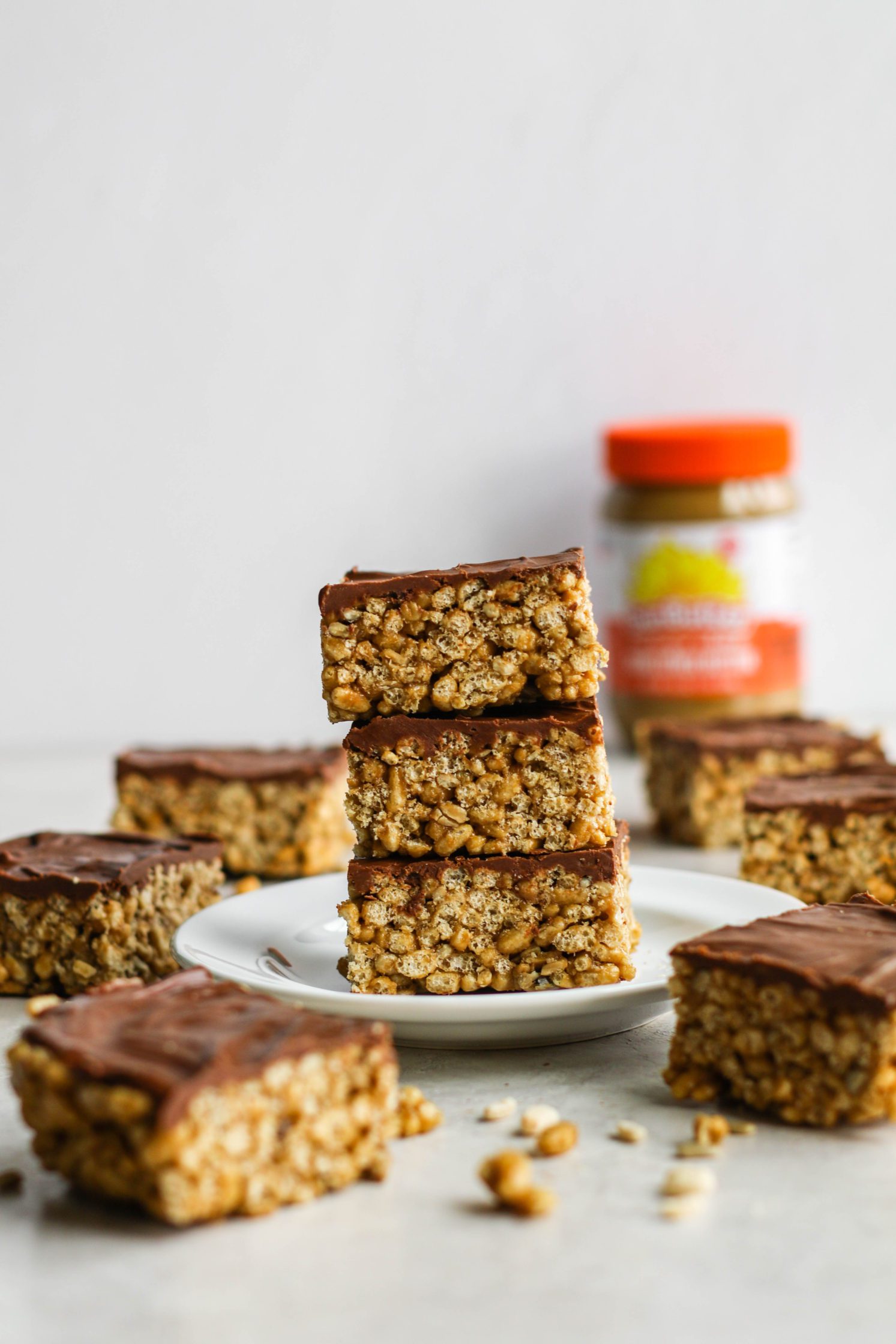 Chocolate SunButter Rice Crispy Treats stacked on plate