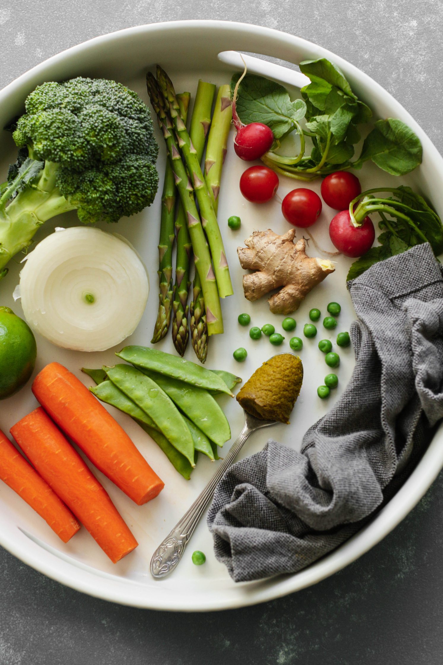 vegetables for spring green curry in white serving board