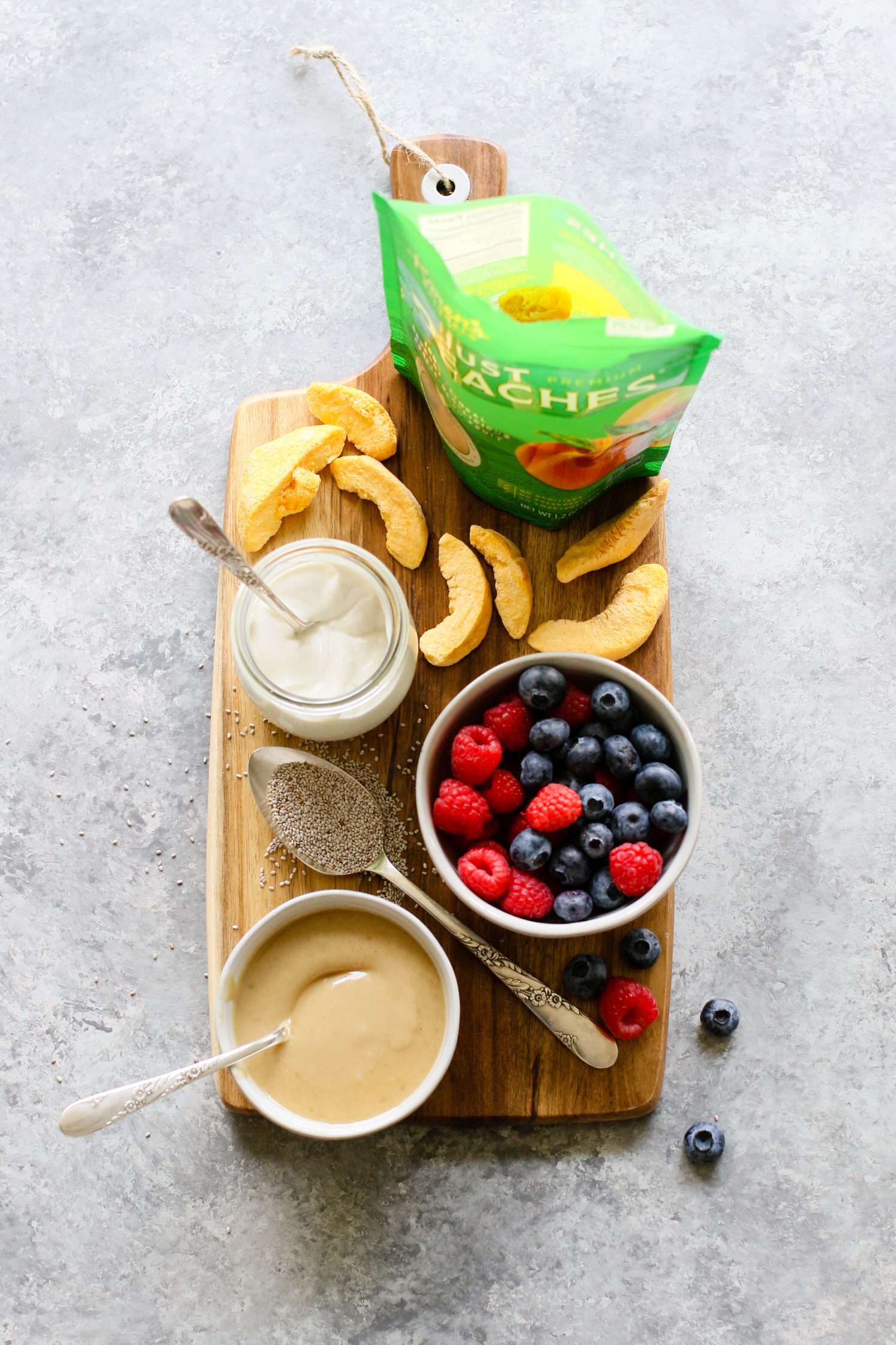ingredients for Stone Fruit Stuffed Sweet Potatoes on wooden board