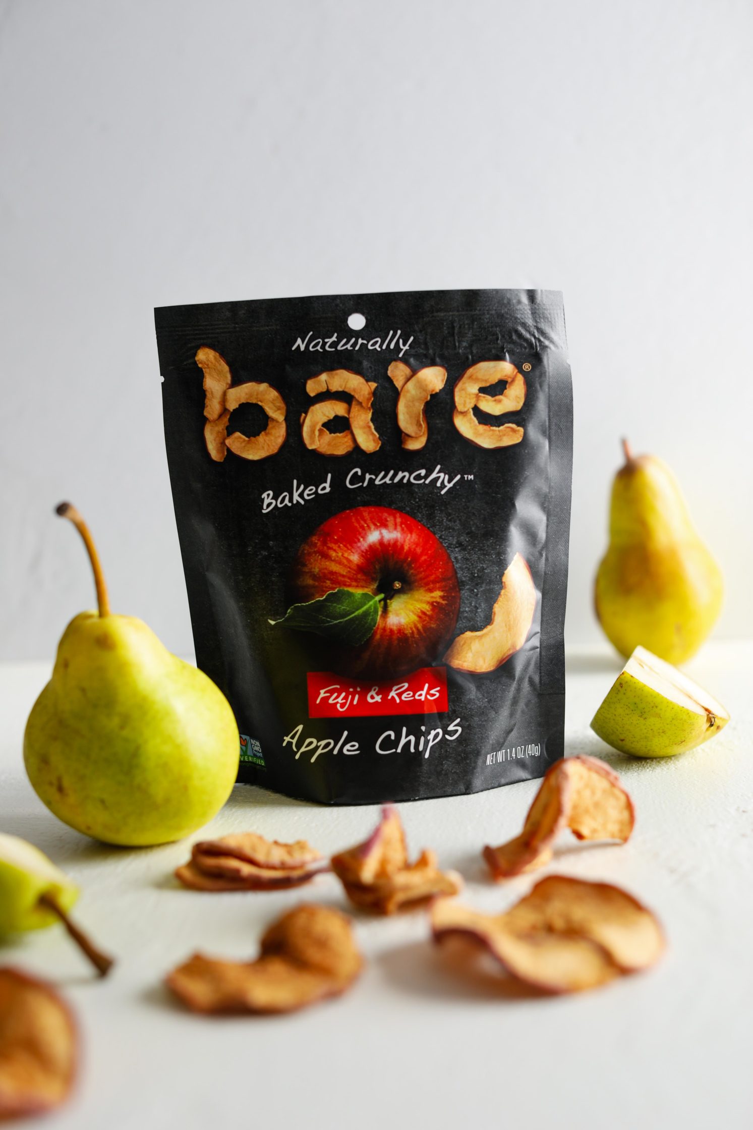 Bare Snacks Apple Chips surrounded by pears by Flora & Vino
