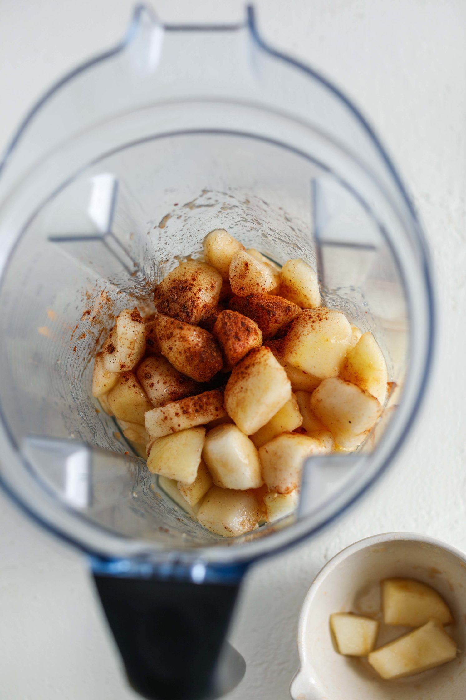diced pear in blender with cinnamon in Vitamix by Flora & Vino
