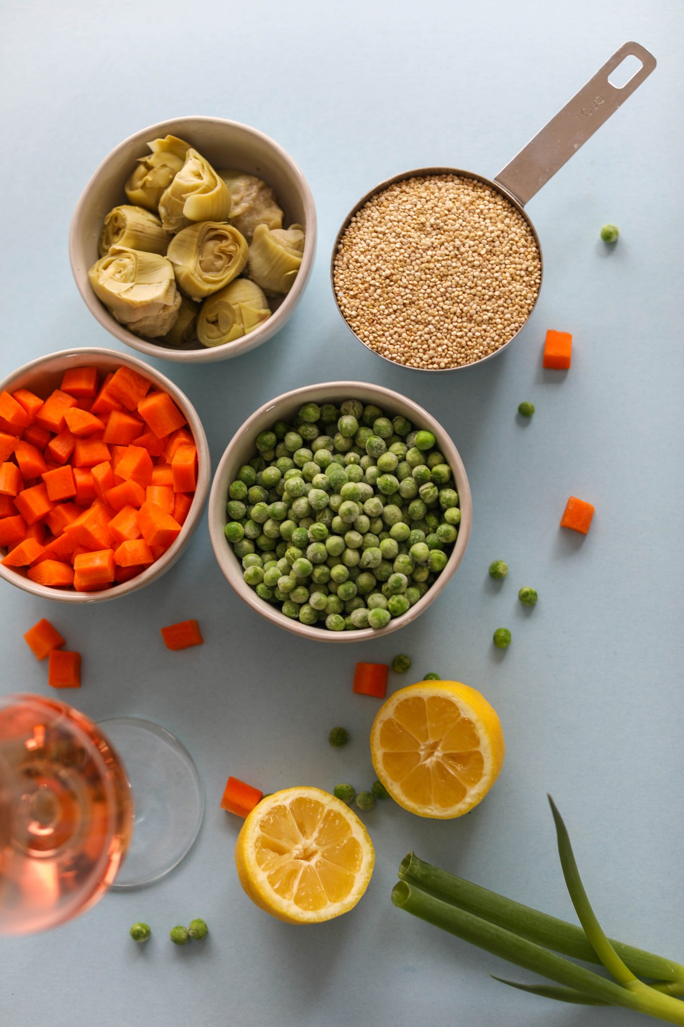 Spring Quinoa Primavera Ingredients on blue paper