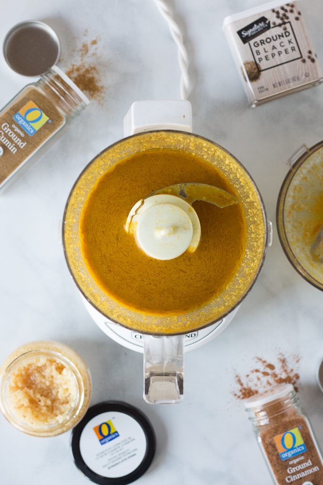 dressing mixed in food processor with spices on the side