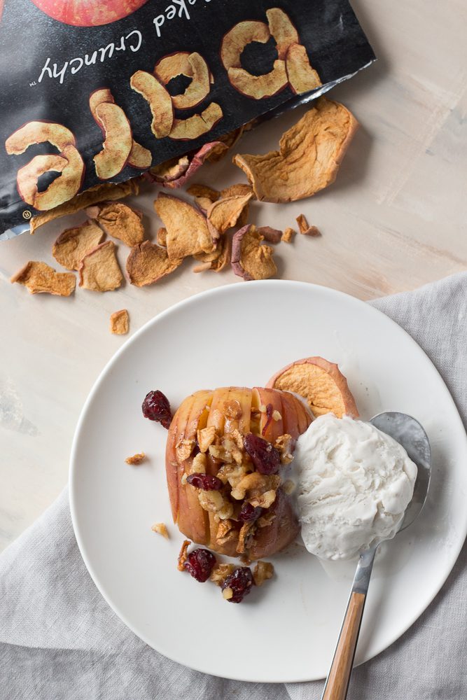 Hasselback Baked Apples served on plates with ice cream and apple chips by Flora & Vino
