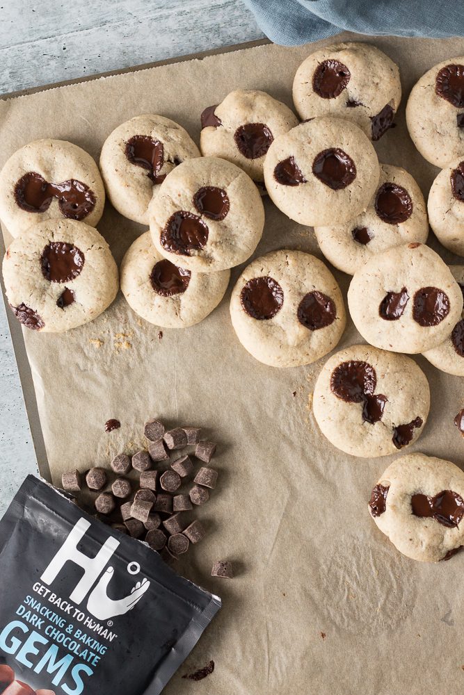 Tahini Chocolate Chip Macademia Nut Cookies baked on baking sheet by Flora & Vino