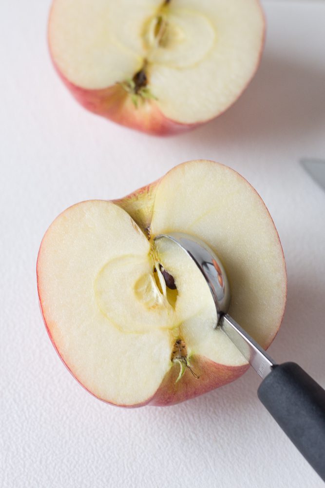 apples with core scooped out by Flora & Vino