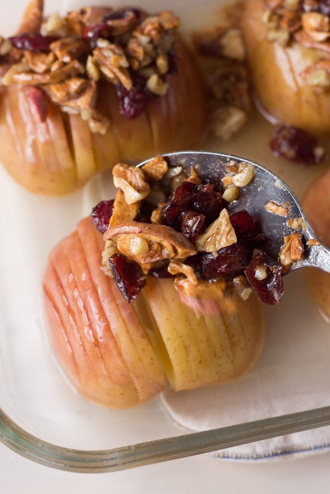 Hasselback Baked Apples topped with nuts and seeds by Flora & Vino