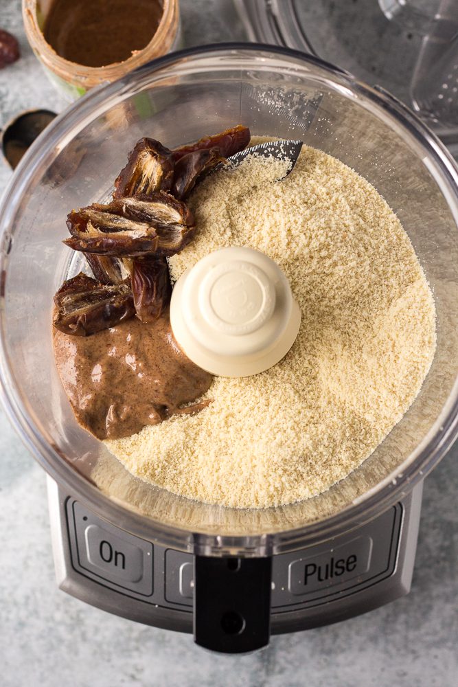 dates, almond butter, and almond flour in blender by Flora & Vino