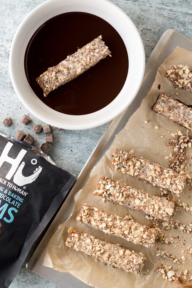 Date Caramel Nougat Bars dipped in dark chocolate by Flora & Vino