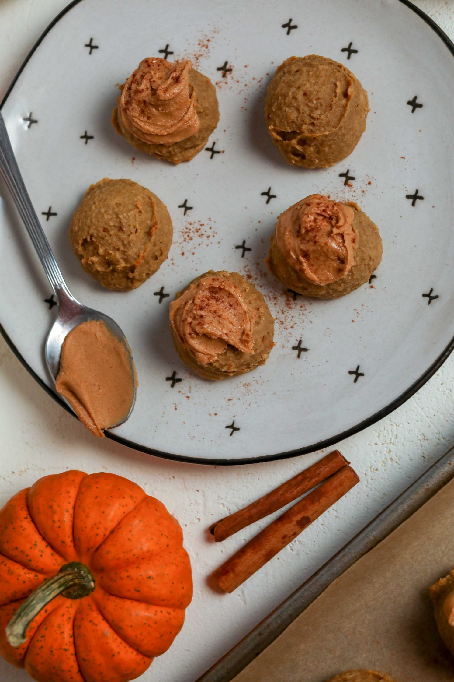 Pumpkin Spice Chickpea Cookies served on plate with cashew butter by Flora & Vino