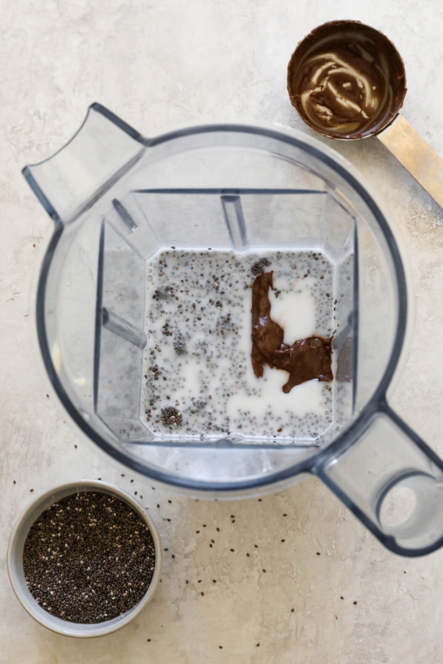 almond milk with chia seeds and Chocolate SunButter in Vitamix blender
