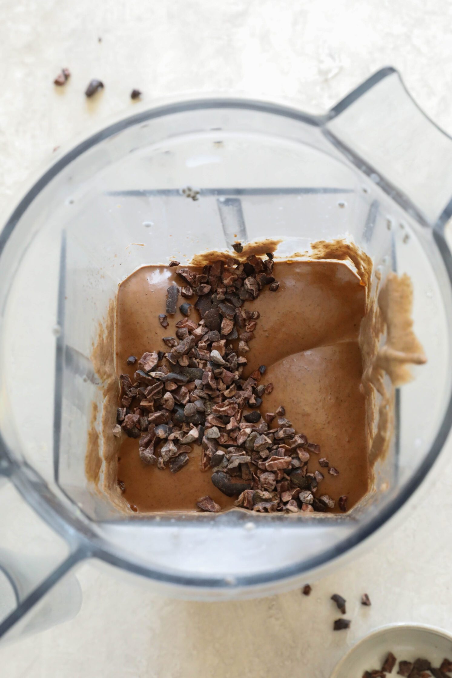 chia pudding blended in Vitamix blender with cacao nibs on top